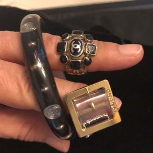 Chanel broken bracelet, CC ring and logo buckle.